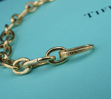Tiffany & Co. 18k Yellow Gold Clasping Link Charm Bracelet 7.25" 7mm BG944