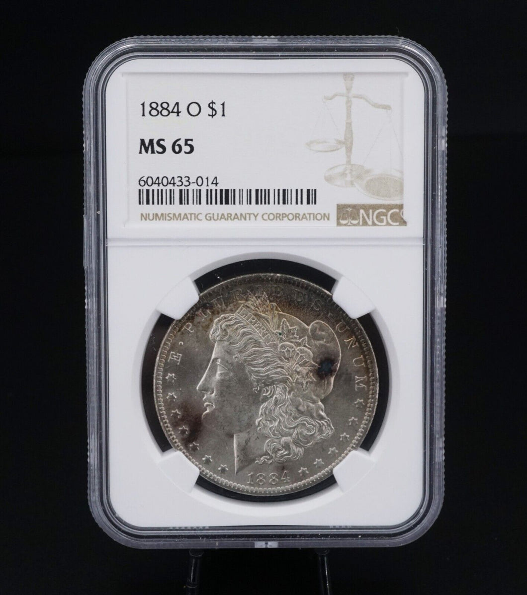 1884-O Morgan $1 Dollar Silver Dollar Coin NGC MS65 New Orleans Spot Toned CN450
